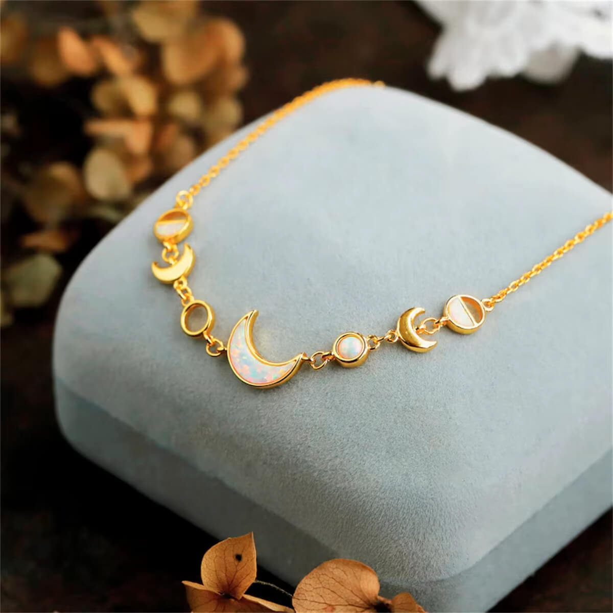 crescent-moon-phase-gold-charm-bracelet